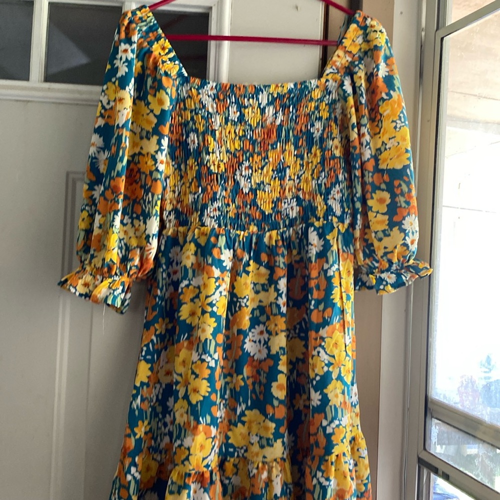 cute floral dress with long sleeve, ruffled at the bottom